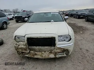 2005 Chrysler 300 with VIN 2C3AA63H05H125190, listed as a Copart auction lot 44228235 with 150,745 mi miles and Salvage Title. Bid and sale history available at carsss.com. Image 10.