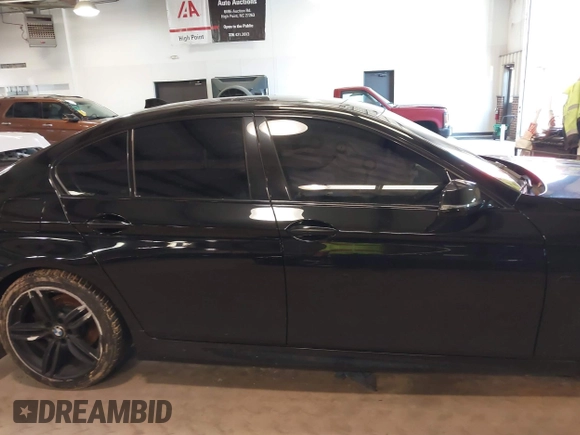 2014 BMW 5 Series 535i with VIN WBA5B1C57ED480208, listed as a IAAI auction lot 41257404 with 114,340 mi miles and . Bid and sale history available at DreamBid. Image 14.