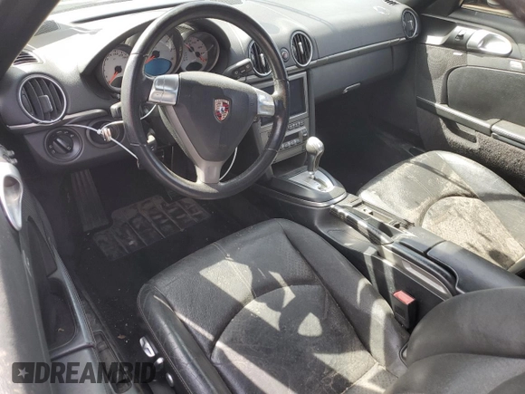 2008 Porsche Boxster S с VIN WP0CB29808U731253, выставлен на аукционе Copart как лот 49583214 с пробегом Не указан миль и Списание • Salvage title. История ставок и продаж доступна на DreamBid. Изображение 8.
