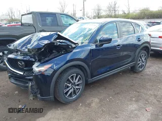 2018 Mazda CX-5 Touring with VIN JM3KFBCM5J0369799, listed as a IAAI auction lot 41895364 with 76,801 mi miles and . Bid and sale history available at carsss.com. Image 17.
