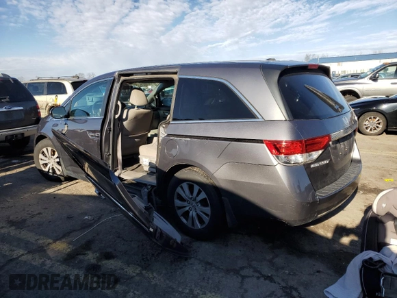 2017 Honda Odyssey SE with VIN 5FNRL5H37HB018616, listed as a Copart auction lot 87174674 with 124,367 mi miles and Salvage Title. Bid and sale history available at carsss.com. Image 2.