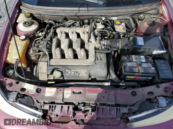 1998 Ford Contour LX with VIN 1FAFP66L4WK261970, listed as a Copart auction lot 42735485 with 106,450 mi miles and Salvage title. Bid and sale history available at DreamBid. Image 11.