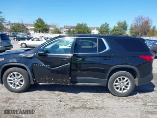 2020 Chevrolet Traverse LT Leather with VIN 1GNEVHKW9LJ200209, listed as a IAAI auction lot 41852864 with 84,079 mi miles. Bid and sale history available at carsss.com. Image 14.