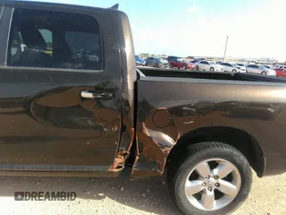 2014 Ram 1500 Big Horn with VIN 1C6RR6LT7ES229297, listed as a IAAI auction lot 42387218 with 99,811 mi miles and . Bid and sale history available at DreamBid. Image 6.
