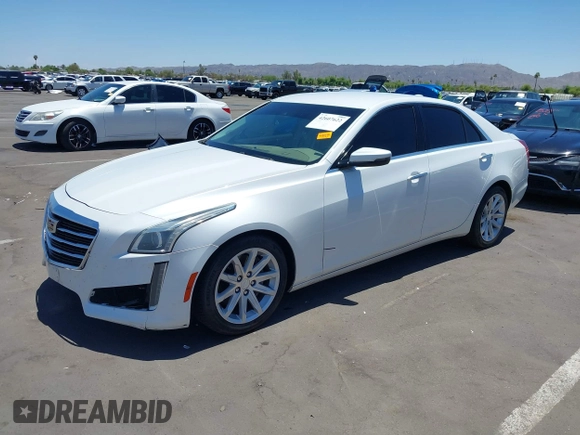 2015 Cadillac CTS Luxury RWD with VIN 1G6AR5SX7F0106703, listed as a IAAI auction lot 42607622 with 79,539 mi miles and . Bid and sale history available at DreamBid. Image 2.