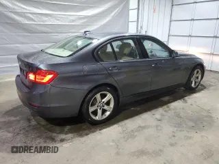 2015 BMW 3 Series 320i xDrive with VIN WBA3C3C52FP664472, listed as a Copart auction lot 55647585 with 129,934 mi miles and Salvage title. Bid and sale history available at DreamBid. Image 3.