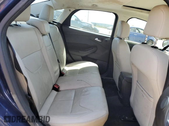 2016 Ford Focus Titanium z VIN 1FADP3J2XGL319399, wystawiony jako Copart lot #59258745 z przebiegiem 215 296 mil mil oraz Szkoda całkowita • Salvage title. Historia ofert i sprzedaży dostępna na DreamBid. Obrazek 10.