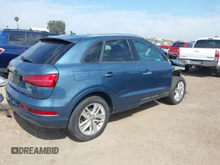 2017 Audi Q3 Premium with VIN WA1ECCFS6HR000870, listed as a IAAI auction lot 42028017 with 103,930 mi miles. Bid and sale history available at carsss.com. Image 4.