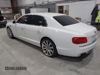 2015 Bentley Flying Spur V8 with VIN SCBET9ZA9F8049207, listed as a IAAI auction lot 41959074 with 85,839 mi miles and . Bid and sale history available at DreamBid. Image 3.