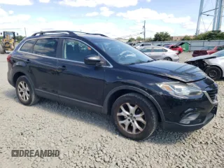 2014 Mazda CX-9 Sport with VIN JM3TB3BV4E0441615, listed as a Copart auction lot 70126754 with 94,017 mi miles and Salvage Title. Bid and sale history available at carsss.com. Image 4.