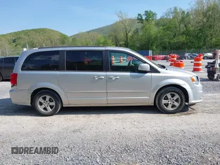 2012 Dodge Grand Caravan SXT with VIN 2C4RDGCG0CR284124, listed as a IAAI auction lot 42103224 with 131,691 mi miles and . Bid and sale history available at DreamBid. Image 13.