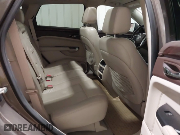 2014 Cadillac SRX Performance Collection z VIN 3GYFNFE38ES578066, wystawiony jako IAAI lot #42153023 z przebiegiem 134 009 mil mil oraz . Historia ofert i sprzedaży dostępna na DreamBid. Obrazek 8.