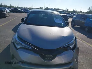 2019 Toyota C-HR XLE with VIN NMTKHMBX4KR082574, listed as a IAAI auction lot 41694921 with 61,777 mi miles and . Bid and sale history available at DreamBid. Image 12.