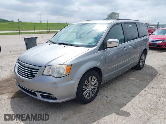 2014 Chrysler Town & Country Touring-L with VIN 2C4RC1CG2ER107917, listed as a IAAI auction lot 42180194 with 169,447 mi miles. Bid and sale history available at carsss.com. Image 17.