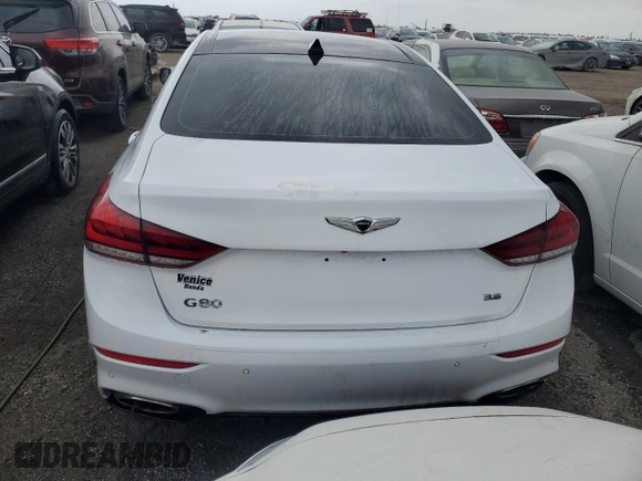 2019 Genesis G80 3.8L z VIN KMHGN4JEXKU289140, wystawiony jako Copart lot #76827084 z przebiegiem Nie podano mil oraz Nie do naprawy • Non repairable. Historia ofert i sprzedaży dostępna na DreamBid. Obrazek 6.