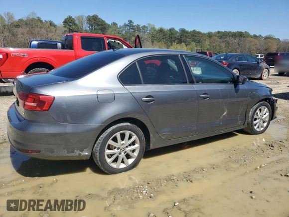 2015 Volkswagen Jetta SE with VIN 3VWD17AJXFM259533, listed as a Copart auction lot 52295555 with 170,886 mi miles and Salvage title. Bid and sale history available at DreamBid. Image 3.