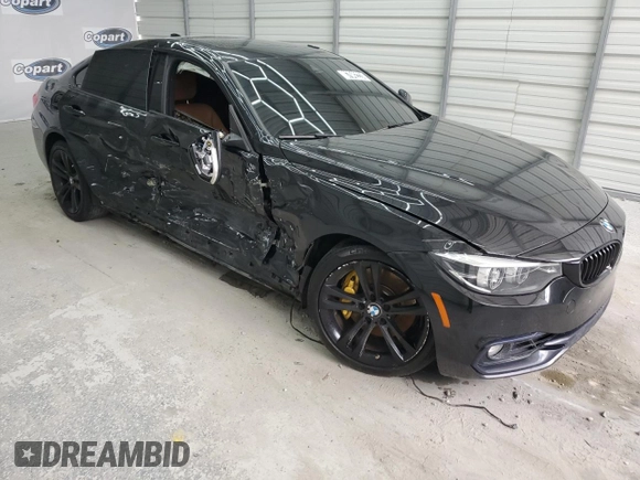 2018 BMW 4 Series 440i with VIN WBA4J5C59JBF07309, listed as a Copart auction lot 74893994 with 89,054 mi miles and Salvage Title. Bid and sale history available at DreamBid. Image 4.