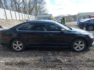 2013 Volkswagen Passat SE w/Sunroof & Nav with VIN 1VWBP7A35DC133246, listed as a IAAI auction lot 41972079 with 97,785 mi miles. Bid and sale history available at carsss.com. Image 13.
