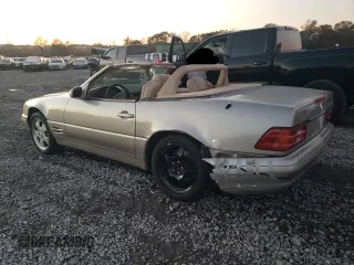 1999 Mercedes-Benz SL-Class with VIN WDBFA68F8XF178084, listed as a Copart auction lot 82295024 with 123,008 mi miles and Salvage Title. Bid and sale history available at carsss.com. Image 2.