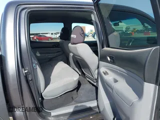 2014 Toyota Tacoma PreRunner with VIN 3TMJU4GN1EM156845, listed as a IAAI auction lot 40972570 with 65,138 mi miles. Bid and sale history available at carsss.com. Image 8.