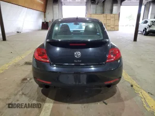 2014 Volkswagen Beetle Turbo R-Line with VIN 3VWVT7ATXEM665178, listed as a Copart auction lot 75652044 with Not Provided miles and Salvage Title. Bid and sale history available at DreamBid. Image 6.