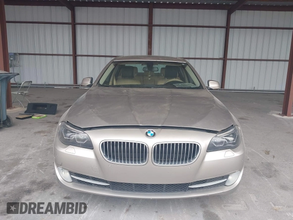 2013 BMW 5 Series 528i with VIN WBAXG5C52DDY35141, listed as a IAAI auction lot 41883031 with 112,917 mi miles and . Bid and sale history available at carsss.com. Image 6.