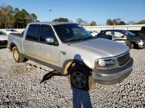 2002 Ford F-150 XLT with VIN 1FTRW07662KD38462, listed as a Copart auction lot 86968144 with 228,520 mi miles and Salvage Title. Bid and sale history available at carsss.com. Image 4.