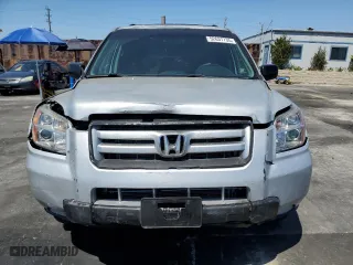 2007 Honda Pilot LX with VIN 5FNYF281X7B012081, listed as a Copart auction lot 52637735 with 142,729 mi miles and Salvage Title. Bid and sale history available at carsss.com. Image 5.