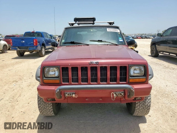 1999 Jeep Cherokee Sport с VIN 1J4FT68S5XL675839, выставлен на аукционе Copart как лот 65230005 с пробегом 204 102 миль миль и Списание • Salvage title. История ставок и продаж доступна на DreamBid. Изображение 5.
