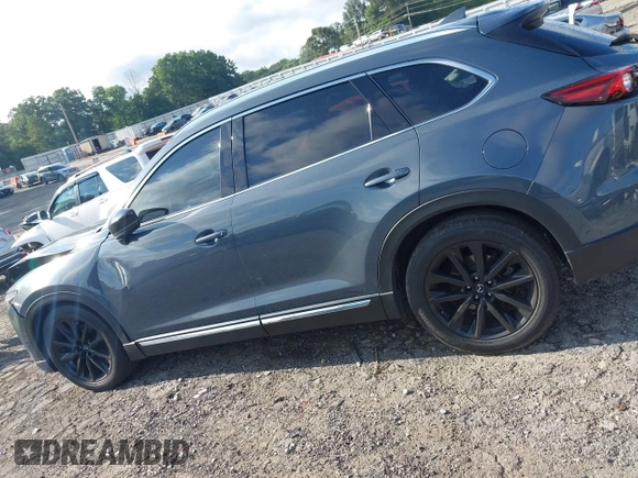2021 Mazda CX-9 Grand Touring with VIN JM3TCADY7M0528223, listed as a IAAI auction lot 42395861 with 57,767 mi miles and . Bid and sale history available at DreamBid. Image 14.