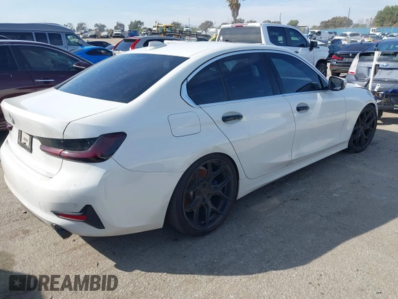2019 BMW 3 Series 330i with VIN WBA5R1C59KAJ99746, listed as a IAAI auction lot 41566192 with 55,090 mi miles and . Bid and sale history available at DreamBid. Image 4.