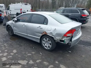 2009 Honda Civic Sdn LX with VIN 2HGFA16559H313538, listed as a IAAI auction lot 42052791 with 136,594 mi miles. Bid and sale history available at carsss.com. Image 3.