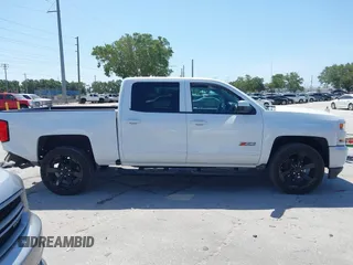 2017 Chevrolet Silverado 1500 LT with VIN 3GCUKREC4HG391101, listed as a IAAI auction lot 42129151 with 84,670 mi miles and . Bid and sale history available at DreamBid. Image 13.