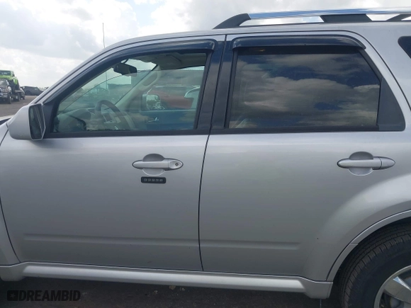 2011 Mercury Mariner Premier with VIN 4M2CN8H79BKJ02879, listed as a IAAI auction lot 41961370 with 161,793 mi miles. Bid and sale history available at carsss.com. Image 13.