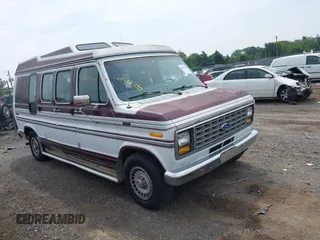 1991 Ford Econoline Cargo z VIN 1FDEE14N6MHA13731, wystawiony jako IAAI lot #42488264 z przebiegiem 51 690 mil mil oraz . Historia ofert i sprzedaży dostępna na DreamBid. Obrazek 1.