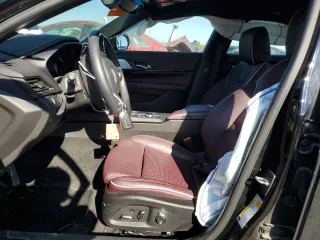 2022 Cadillac CT4-V z VIN 1G6DH5RL2N0121059, wystawiony jako Copart lot #71968614 z przebiegiem 55 049 mil mil oraz Szkody całkowita. Historia ofert i sprzedaży dostępna na DreamBid. Obrazek 7.