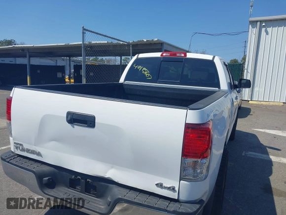 2011 Toyota Tundra 4WD Truck with VIN 5TFUM5F15BX023822, listed as a IAAI auction lot 42125607 with 194,779 mi miles. Bid and sale history available at carsss.com. Image 4.