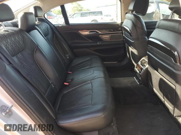 2016 BMW 7 Series 750i xDrive с VIN WBA7F2C58GG419163, выставлен на аукционе Copart как лот 52429835 с пробегом 93 025 миль миль и Списание • Salvage title. История ставок и продаж доступна на DreamBid. Изображение 10.