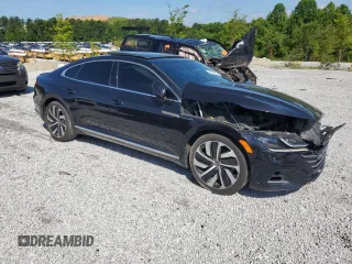 2021 Volkswagen Arteon SEL R-Line с VIN WVWHR7AN7ME013073, выставлен на аукционе Copart как лот 60761015 с пробегом 62 546 миль миль и Чистый • Clean title. История ставок и продаж доступна на DreamBid. Изображение 4.