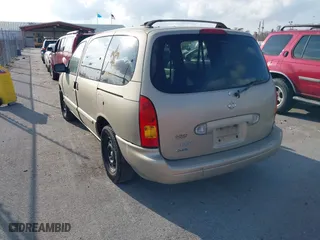 1999 Nissan Quest GXE with VIN 4N2XN11T6XD830660, listed as a IAAI auction lot 41508574 with 146,803 mi miles. Bid and sale history available at carsss.com. Image 3.