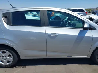 2014 Chevrolet Sonic LS with VIN 1G1JA6SH1E4135729, listed as a IAAI auction lot 42169273 with 74,969 mi miles and . Bid and sale history available at DreamBid. Image 13.