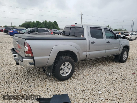 2014 Toyota Tacoma with VIN 3TMMU4FN0EM072840, listed as a Copart auction lot 51740805 with 128,678 mi miles and Salvage title. Bid and sale history available at DreamBid. Image 3.
