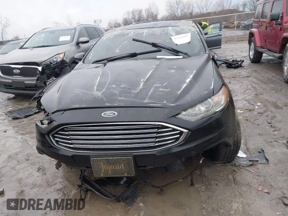 2017 Ford Fusion SE z VIN 3FA6P0H7XHR404013, wystawiony jako IAAI lot #41664822 z przebiegiem Nie podano mil oraz . Historia ofert i sprzedaży dostępna na DreamBid. Obrazek 12.