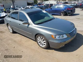 2006 Hyundai Azera SE with VIN KMHFC46F76A100535, listed as a IAAI auction lot 41969960 with 91,131 mi miles and . Bid and sale history available at DreamBid. Image 1.