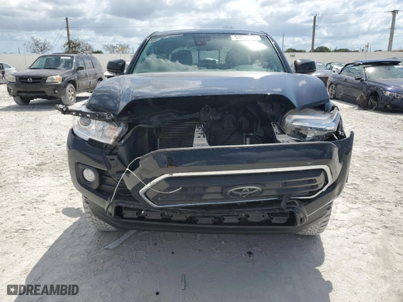 2021 Toyota Tacoma 2WD SR5 with VIN 5TFAZ5CN2MX100662, listed as a Copart auction lot 53911195 with 23,943 mi miles and Salvage Title. Bid and sale history available at carsss.com. Image 5.