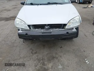 2006 Ford Focus SE z VIN 1FAFP36NX6W214578, wystawiony jako IAAI lot #42316813 z przebiegiem 127 331 mil mil oraz . Historia ofert i sprzedaży dostępna na DreamBid. Obrazek 14.