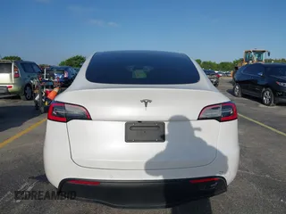 2021 Tesla Model Y Standard Range with VIN 5YJYGDED3MF103650, listed as a IAAI auction lot 41726278 with Not Provided miles and . Bid and sale history available at DreamBid. Image 15.