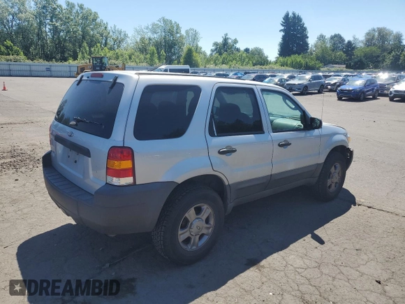 2005 Ford Escape XLS Value with VIN 1FMYU92Z55KC93604, listed as a Copart auction lot 60104145 with 86,788 mi miles and Salvage title. Bid and sale history available at DreamBid. Image 3.