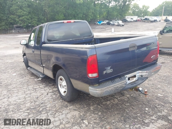 2002 Ford F-150 XL with VIN 1FTRX17202NA66022, listed as a IAAI auction lot 42382320 with 87,916 mi miles and . Bid and sale history available at DreamBid. Image 3.