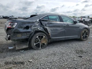 2015 Ford Taurus SEL z VIN 1FAHP2E89FG177287, wystawiony jako Copart lot #56074615 z przebiegiem 196 421 mil mil oraz Szkoda całkowita • Salvage title. Historia ofert i sprzedaży dostępna na DreamBid. Obrazek 3.
